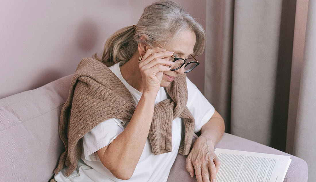 Lady reading about chronic pain treatments