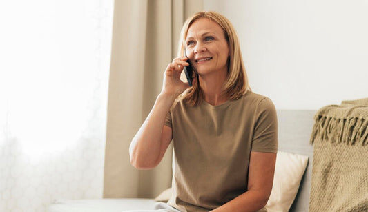 Lady talking on the phone to a doctor