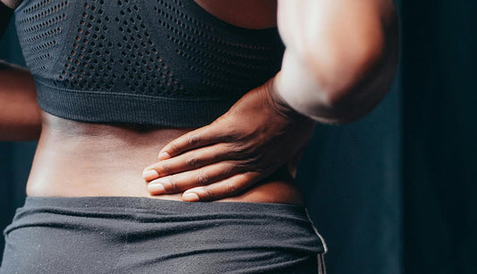 Person with back pain from nerve damage