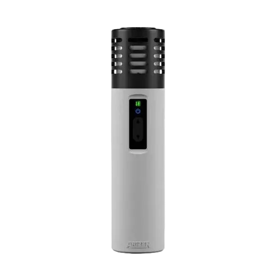 White and black electronic device with a green light on a white background