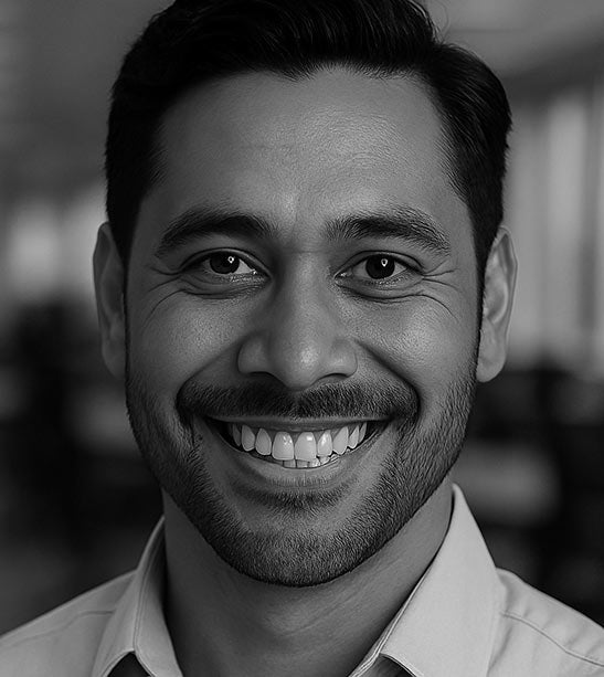Black and white portrait of a man with a smile