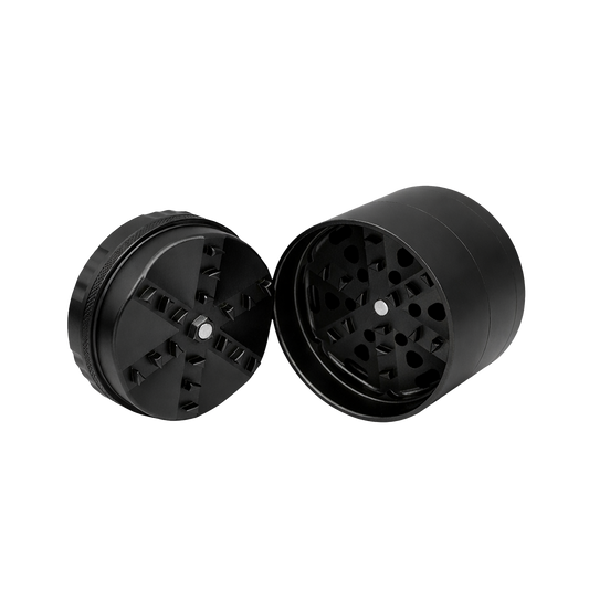 Black metal grinder with two parts on a white background