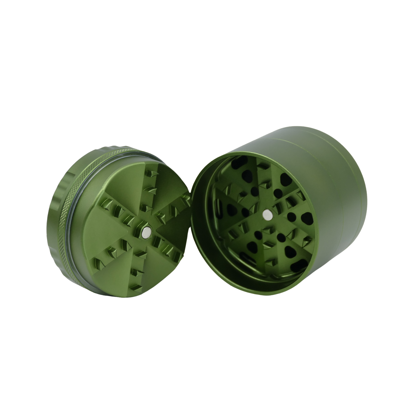 Green metal grinder with two halves on a white background