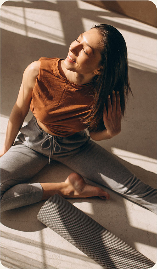 Woman stretching after taking alternative medicine
